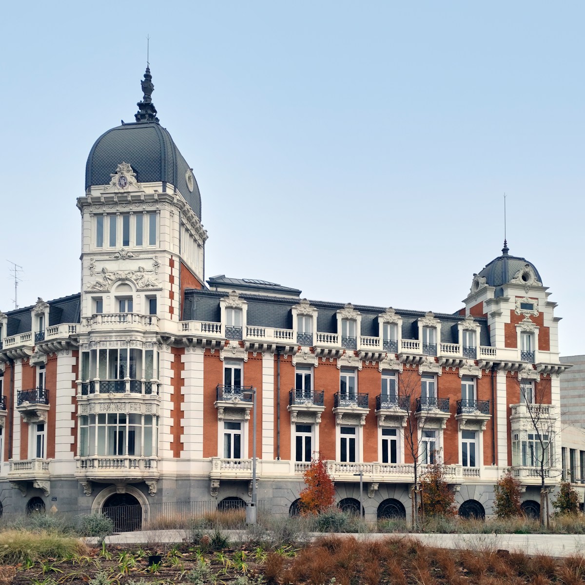 a large building with a clock on the top of it