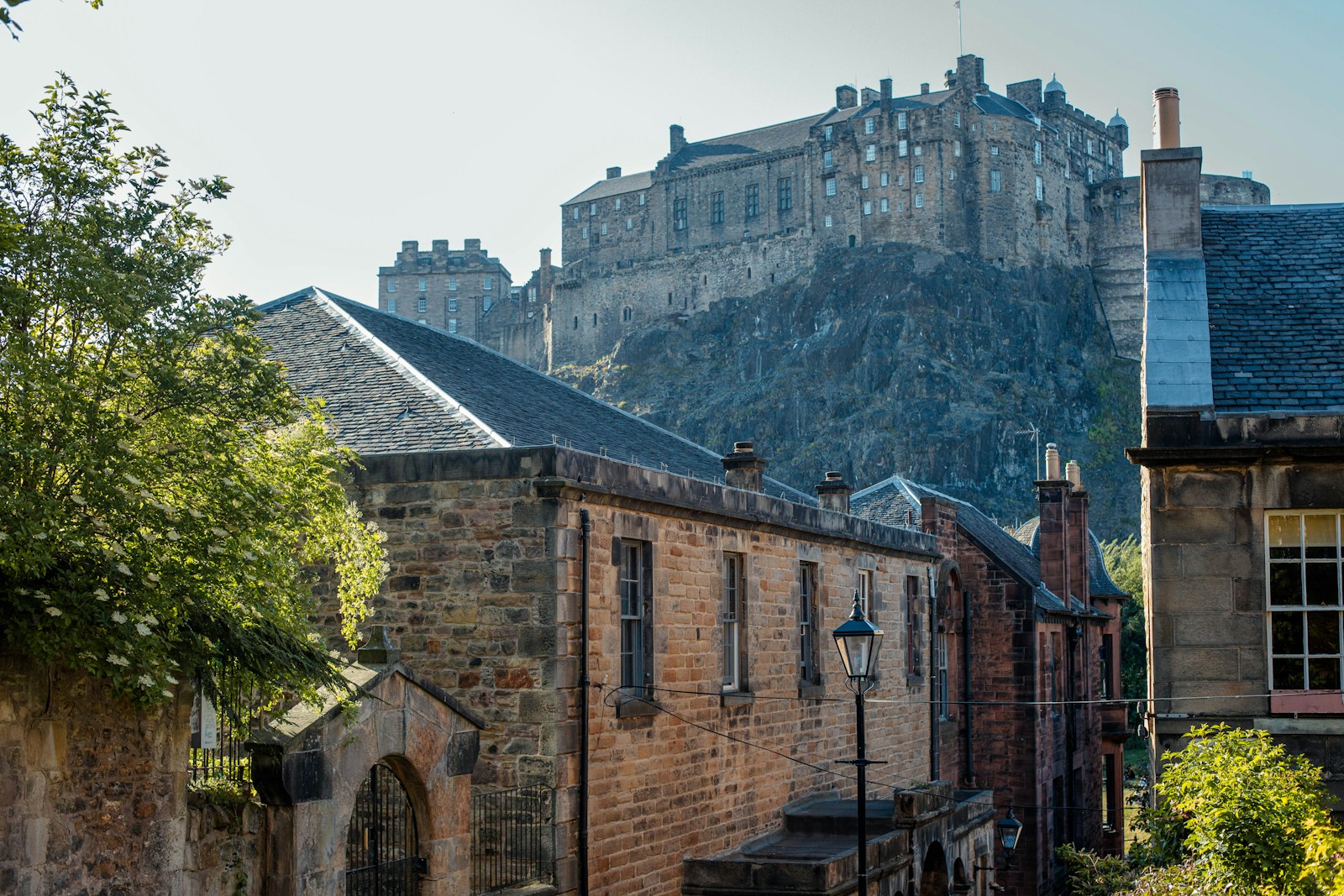 a view of a city with a castle in the background