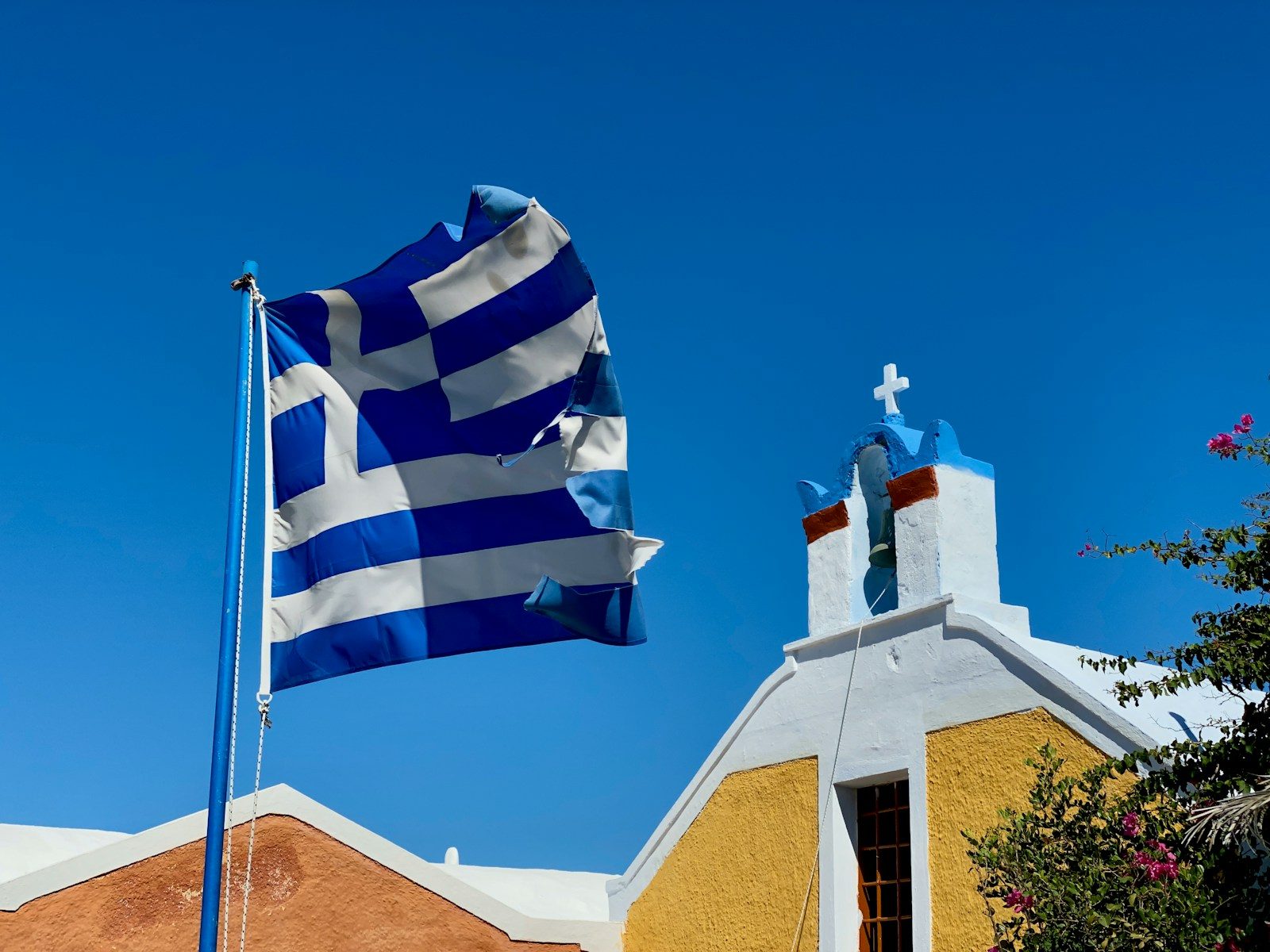 Why the Greece Flag Flies Everywhere—Even on the Beaches